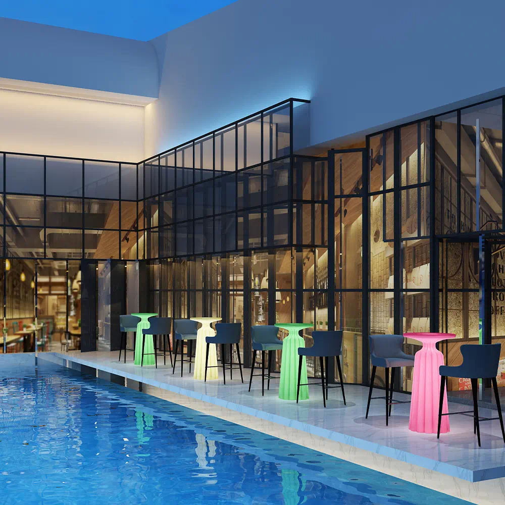 Finished LED Party Cocktail Tables in Outdoor Poolside Setting Demonstrating IP65 Waterproofing and Vibrant RGB Lighting