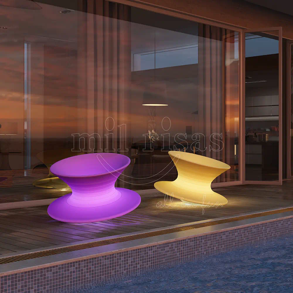 Spun Rotating Chair Lighting up Hotel Poolside