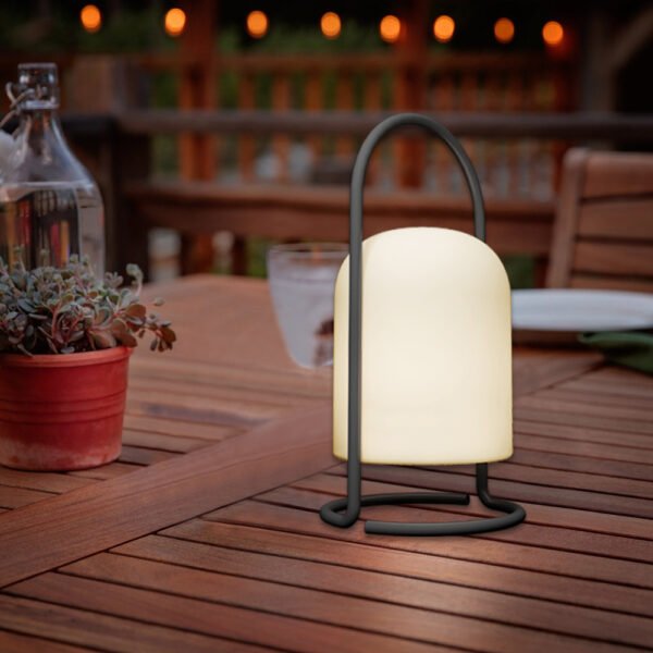 portable led luminaire on the outdoor dining table