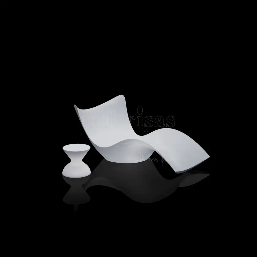 Modern white led lounge chair with a matching small side table, featuring an ergonomic S-curve design for indoor and outdoor use.