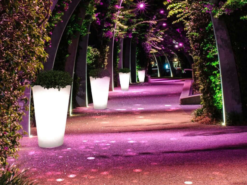 round outdoor tall plastic planters with light