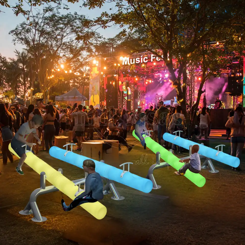 Kids Playing on Glowing LED Twin Seesaw at Nighttime Music Festivals or Outdoor Events