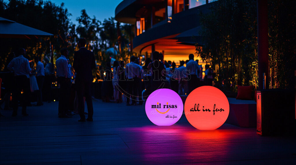 Children and Visitors Playing Around Glowing LED Spheres at a Night Market