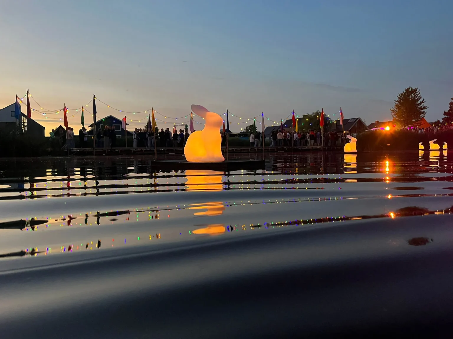 Festival Glowing Rabbit Glowing on Floating Platform at Simmerdeis Festival