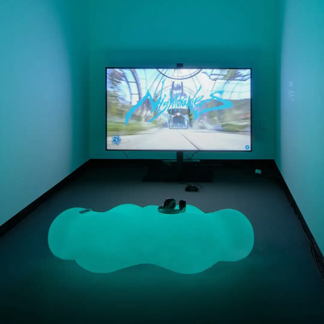Cloud-shaped lighted bench in a dark interactive exhibit.