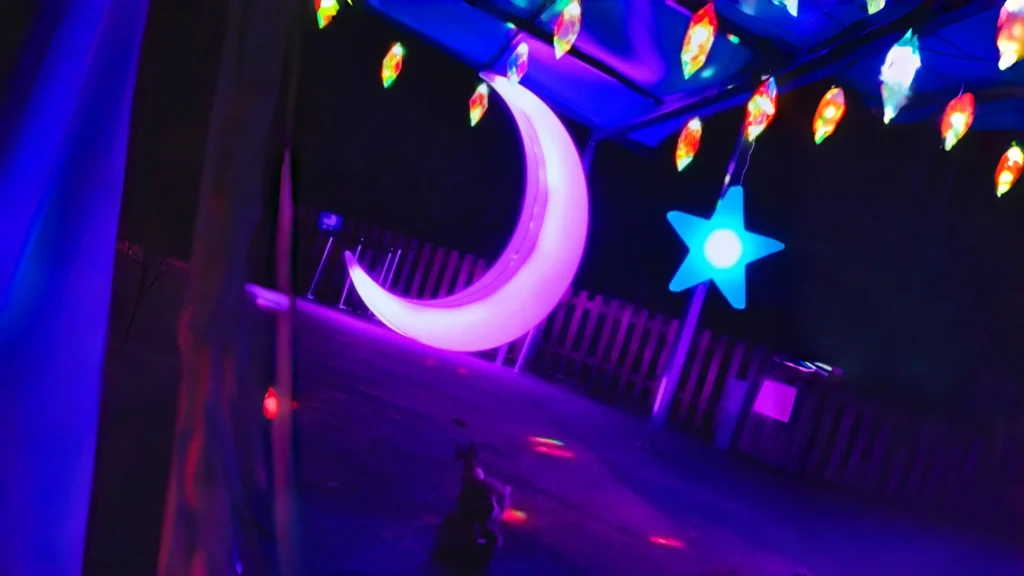 Decorative LED Half moon chair with moon and star lighting.