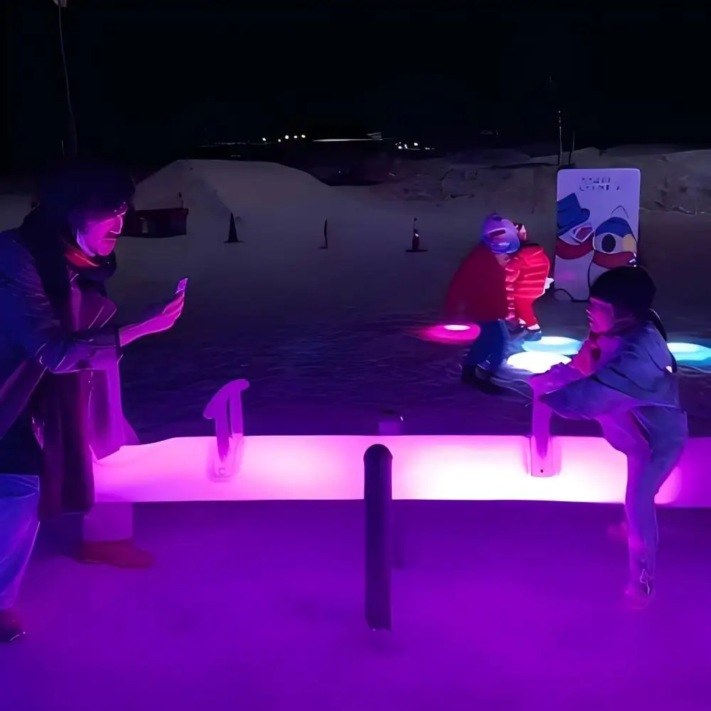 Interactive light up game seesaw for outdoor events and playgrounds