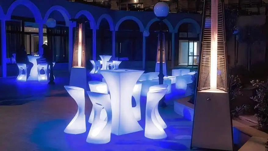 Multi-color RGB LED lighted furniture in a party venue.