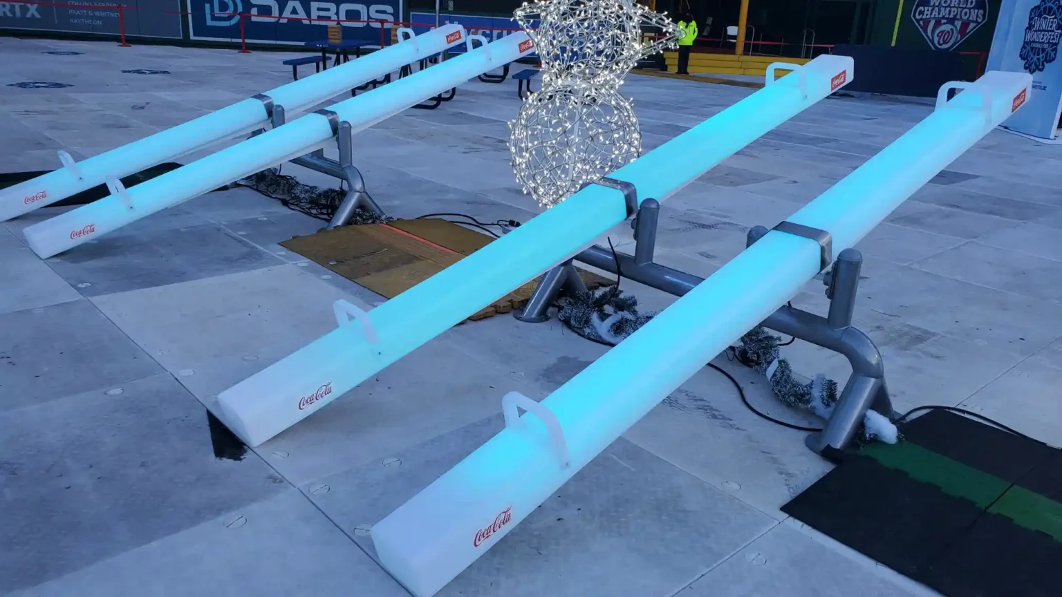 Custom branded LED seesaws for light up games at corporate winter events
