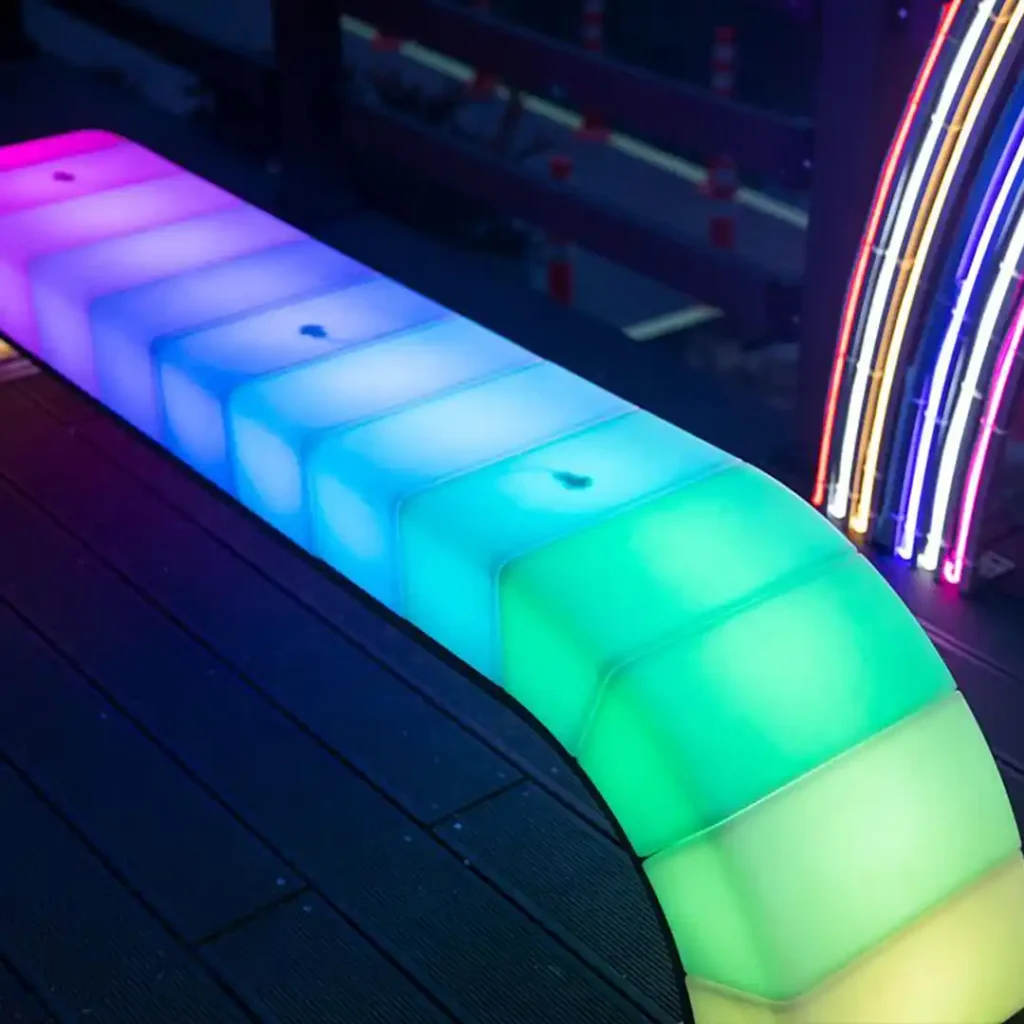 Outdoor Bench With Light A sturdy LED park bench with rainbow-colored lighting