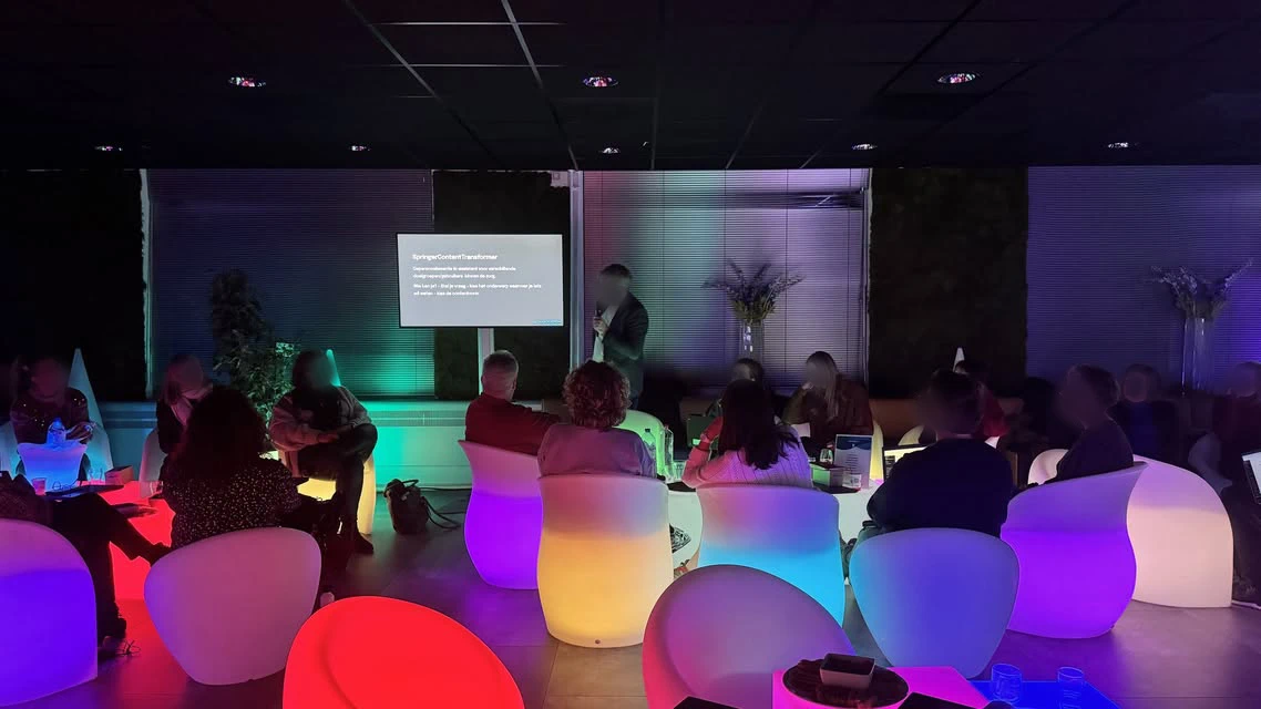 Furniture led lighting setup for a seminar in Hengelo Netherlands, featuring colorful LED chairs and glowing cubes used as tables for interactive group discussion