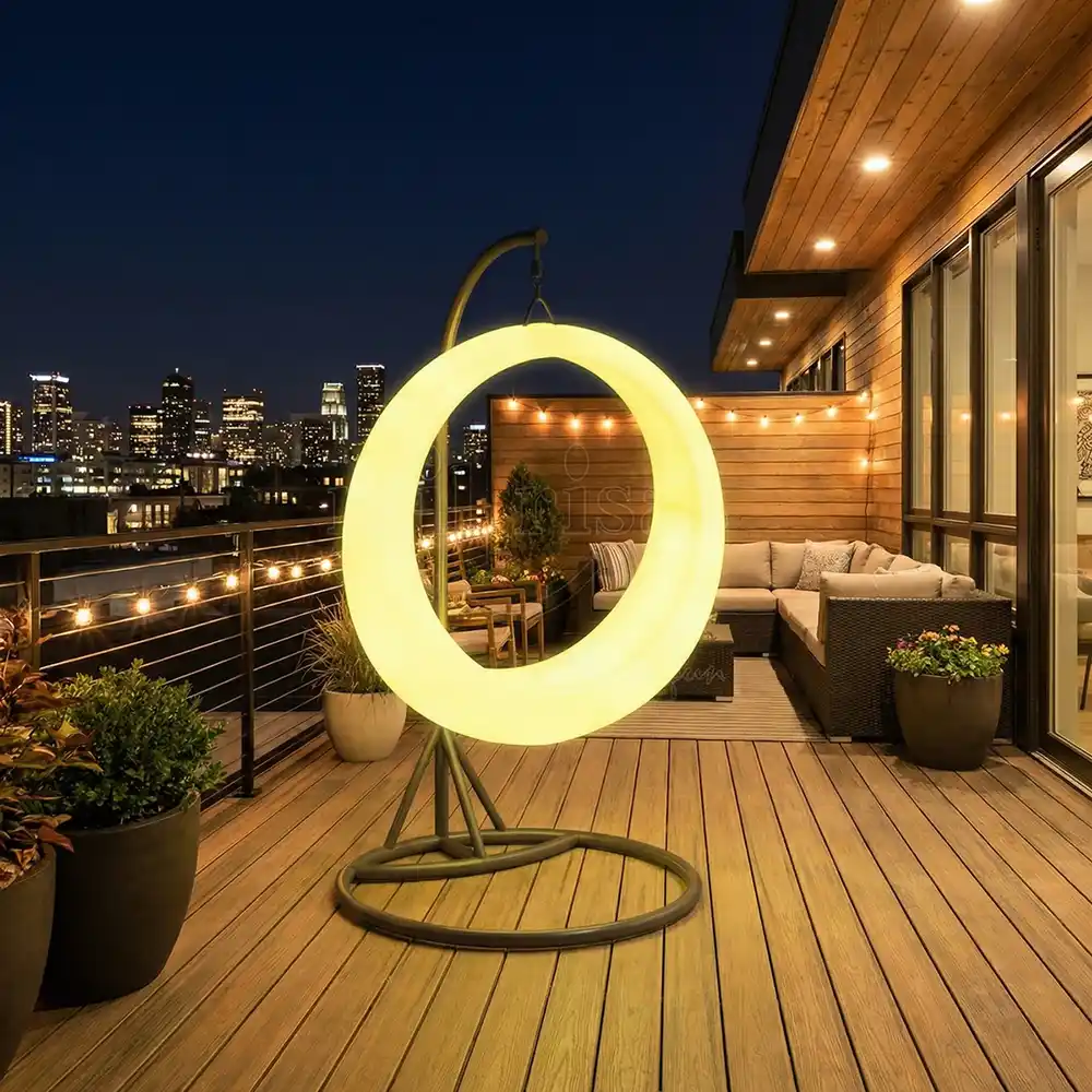 LED Furniture Manufacturer Glowing round outdoor swing chair on a luxury rooftop terrace