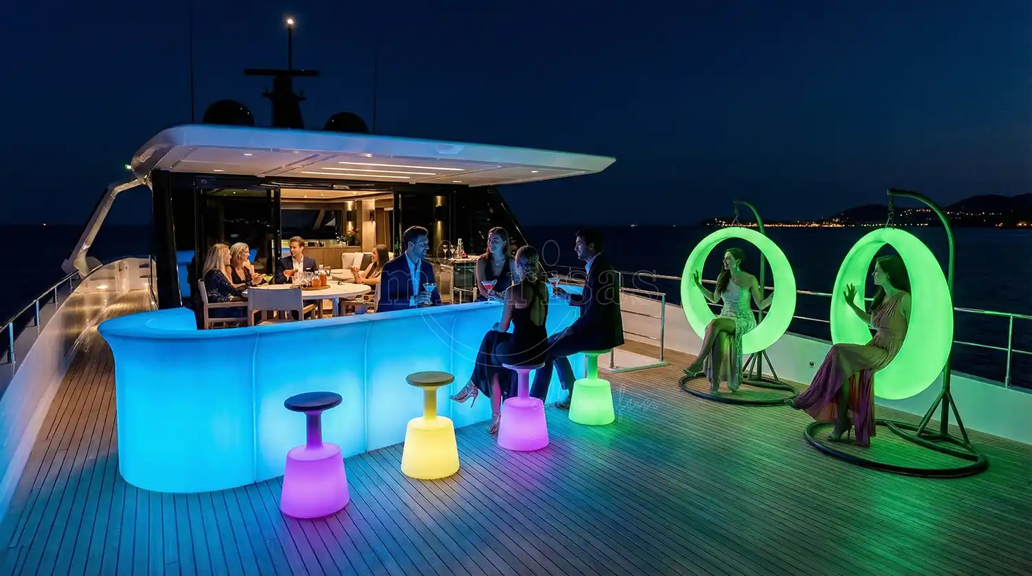 LED Furniture Manufacturer Glowing round outdoor swing chairs on a luxury yacht deck lounge